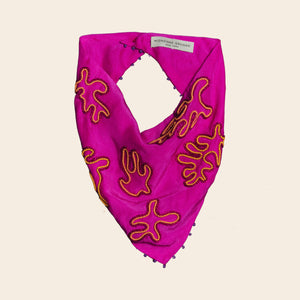 Pink and Orange Bead Embroidered Bandana on Tan Background
