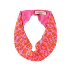 Pink and Red Beaded Leopard Scarf Necklace on Flat White Background