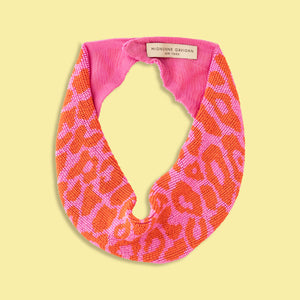 Pink and Red Beaded Leopard Scarf Necklace on Yellow Green Background