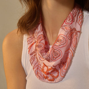 Pink and Red Embroidered Scarf Necklace on Model in White Tank Top