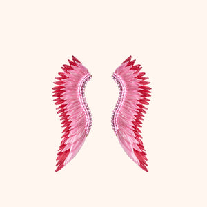 Pink and Red Raffia Sequin Wing Earrings on Flat Tan Background