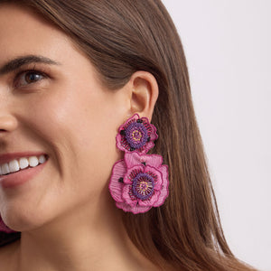 Magenta, Red, Purple, and Yellow Embroidered and Beaded Flower Drop Earrings on Model