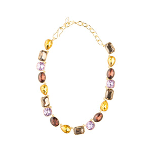 Purple, Yellow, Red, Brown Crystal Necklace on Gold Chain On Flat White Background