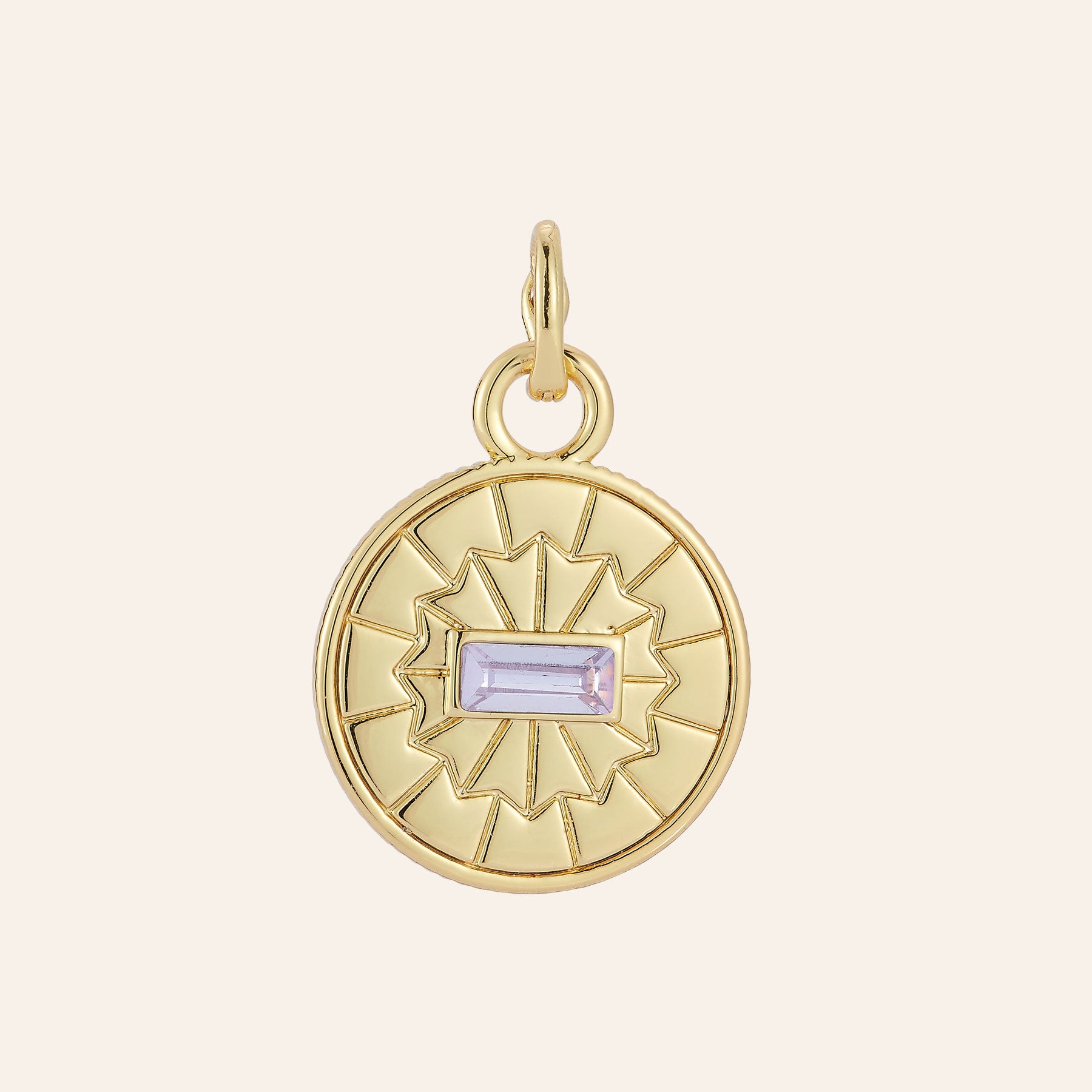 Gold and Purple Crystal Charm on Tan Background