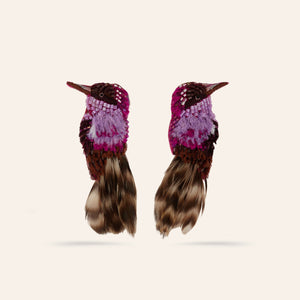 Purple and Brown Beaded and Embroidered Bird Stud Earrings on Tan Background