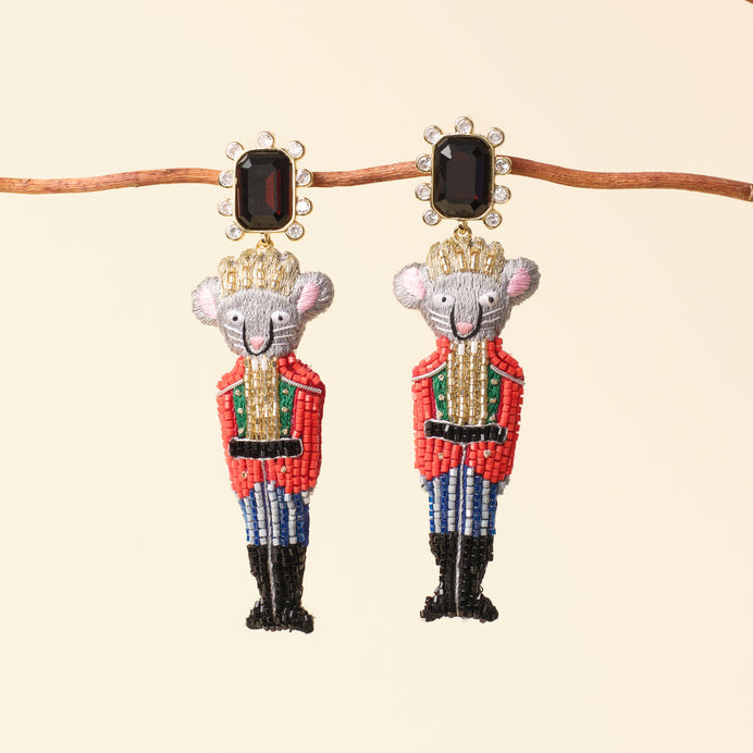 Rat King Nutcracker Drop Earrings Staged on Branch with Tan Background