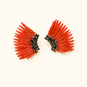 Red Sequin Wing Stud Earrings with Black Crystals on Tan Background