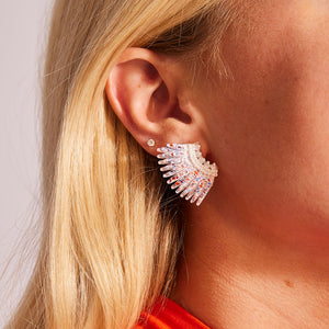 White Sequin Wing Earrings with Red and Blue Splatter Paint on Model's Ear