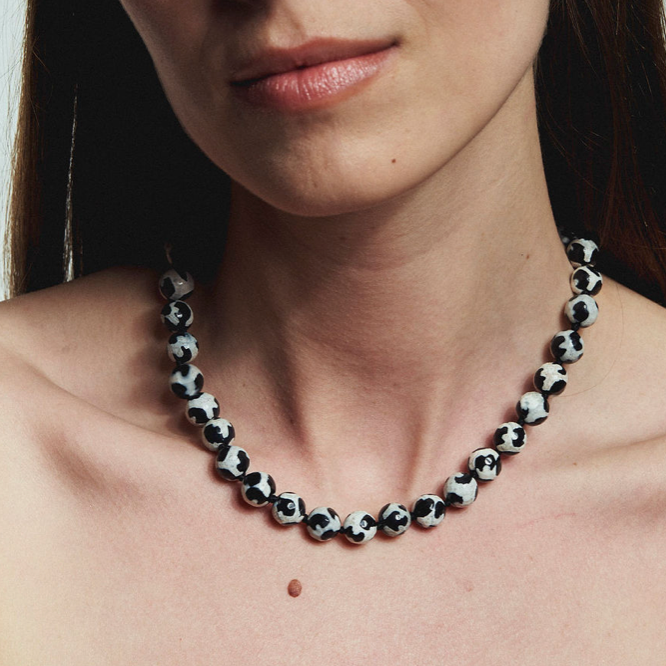 Black and White Beaded Strand Necklace Styled on Model