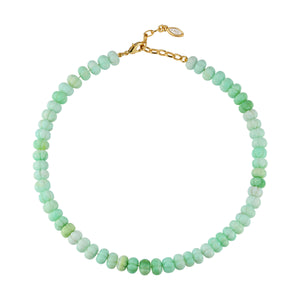 Green Beaded Strand Necklace on Flat White Background