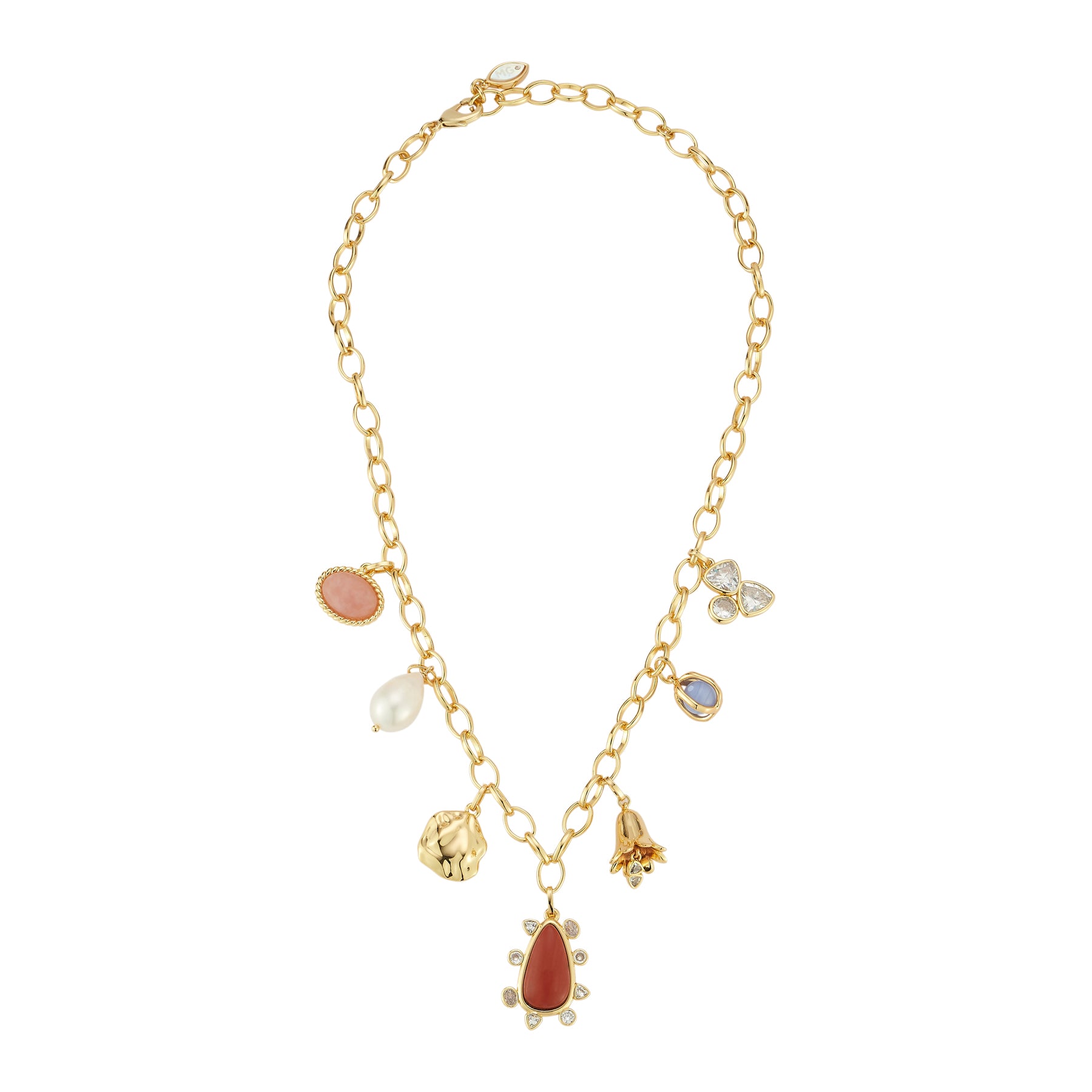 Gold charm necklace with semi-precious stones, pearls, and carnelian centerpiece on flat white background