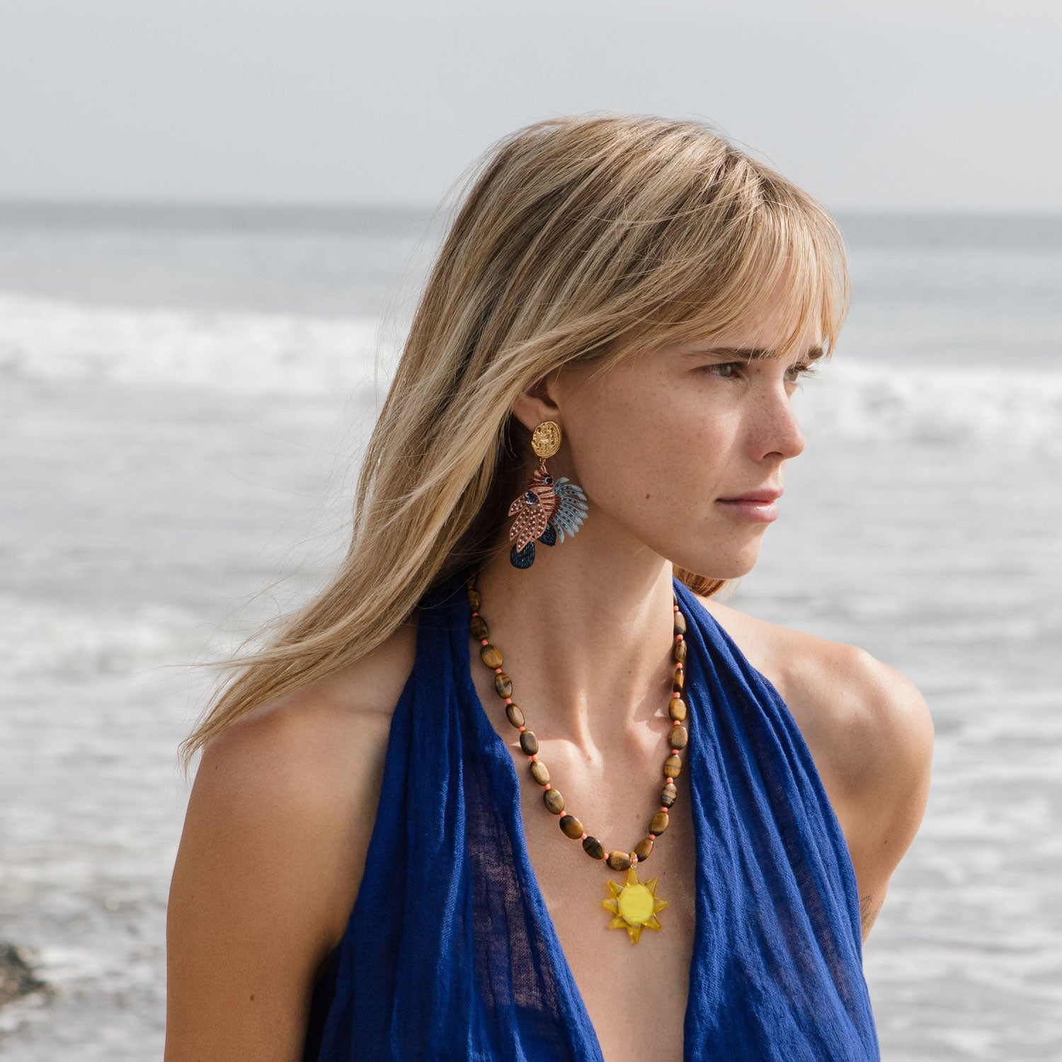 Brown and Coral Beaded Necklace with Yellow Glass Sun Charm Pendant Necklace Styled on Model