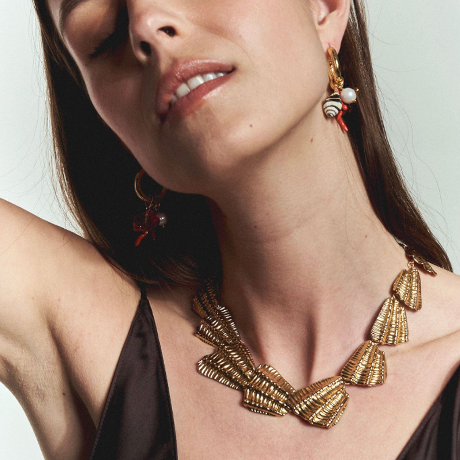 Coral, Shell, and Fish Charm Gold Hoop Earrings Styled on Model