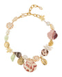 Shell, Pearl, and Bead Collar Necklace on Flat White Background