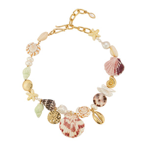 Shell, Pearl, and Bead Collar Necklace on Flat White Background