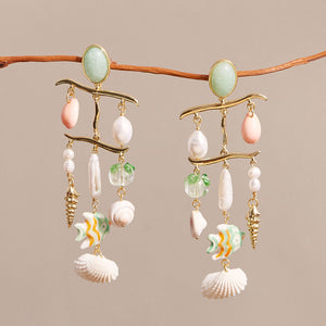 Mint, Coral, Gold, and White Beaded Drop Earrings Styled on Branch