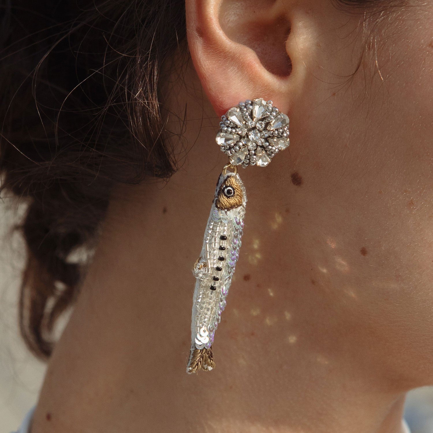 Silver and Blue Beaded and Embroidered Sardine Fish Drop Earrings on Model's Ear