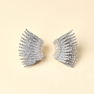 Silver Glitter Sequin Wing Stud Earrings on Tan Background