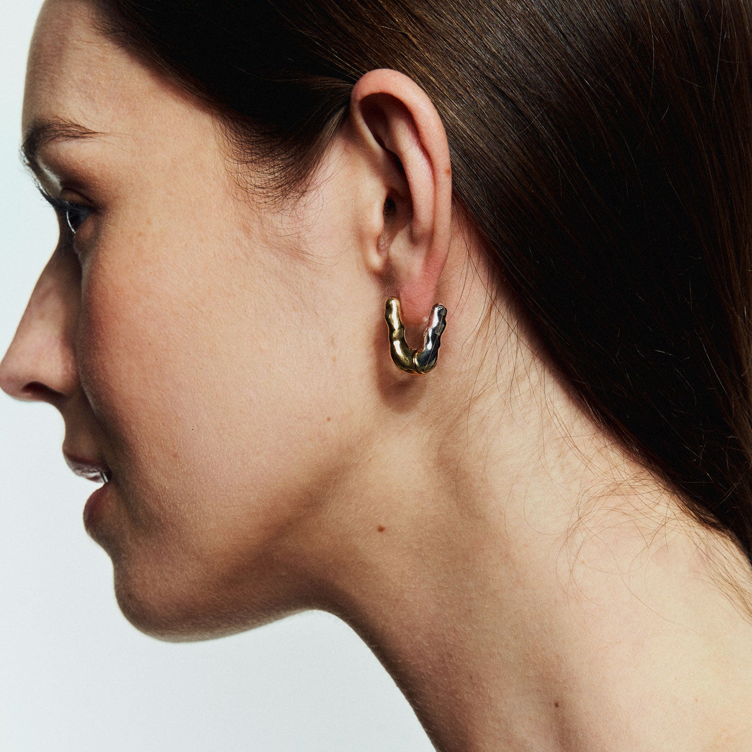 Silver and Gold Mixed Metal Hoop Earrings Styled on Model