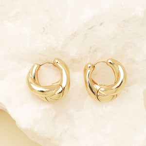 Gold Hoop Earrings Styled on Stone