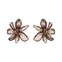 floral embroidered statement earrings against a white background