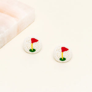 Beaded Golf Flag Stud Earrings on Tan Background