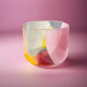 Pink, Yellow, Red, Cream, and Clear Multi Glass Cup on Pink Background