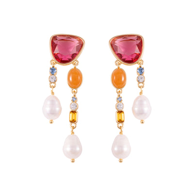 Colorful earrings with pink, orange, and pearl elements on a white background