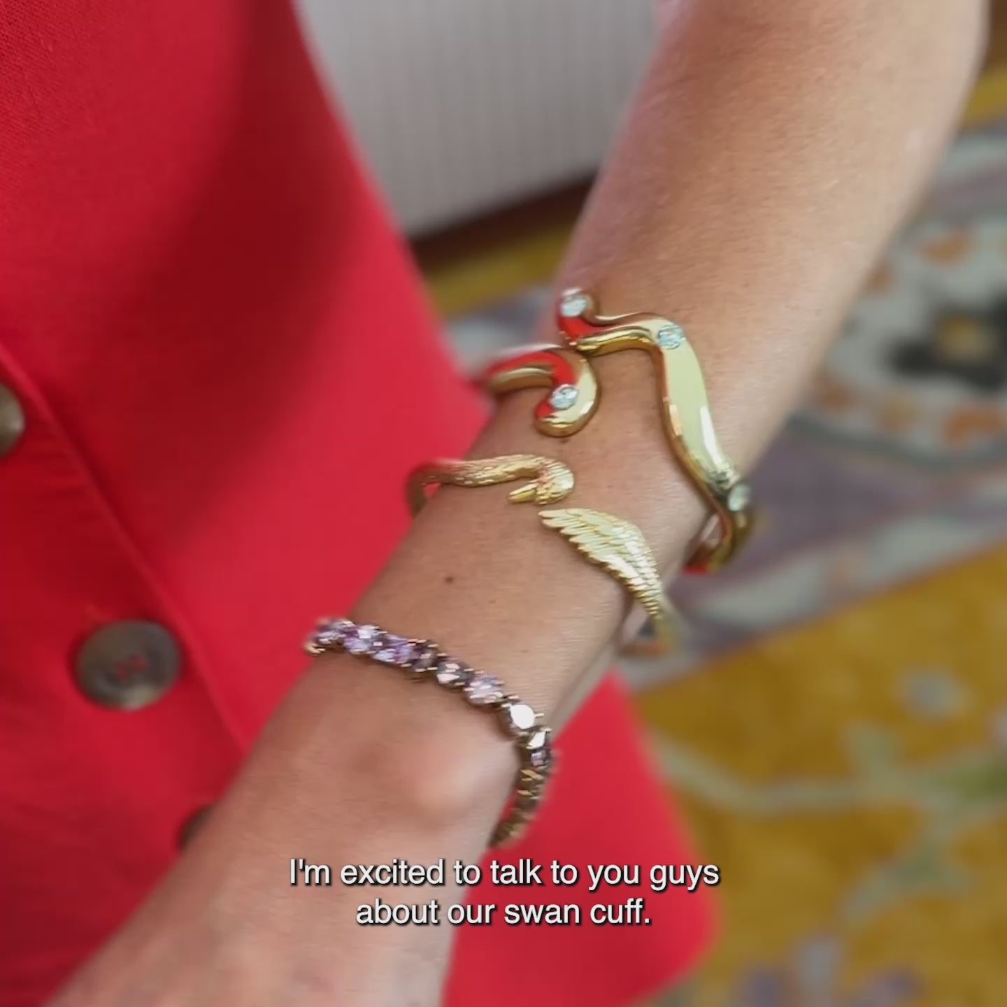 Maggie wearing the gold Swan Cuff