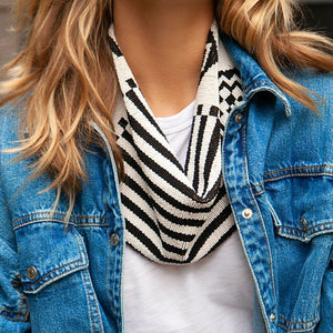 Black and White Geometric Beaded Scarf Necklace Styled on Model in White T-Shirt and Denim Jacket