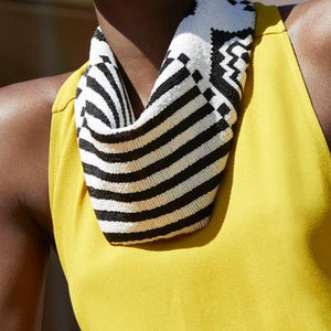 Black and White Geometric Beaded Scarf Necklace Styled on Model in Yellow Dress