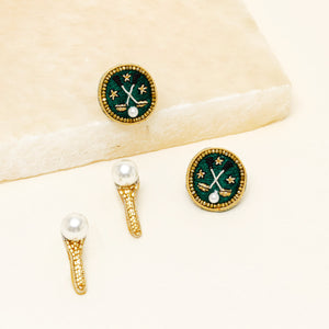 Gold Bead and Pearl Stud Earrings on Tan Background