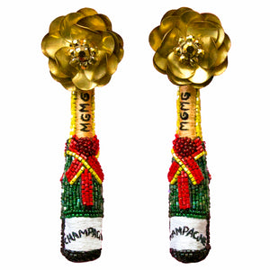 Gold, Red, Green, Black, and White Beaded Champagne Bottle Drop Earrings on Flat White Background