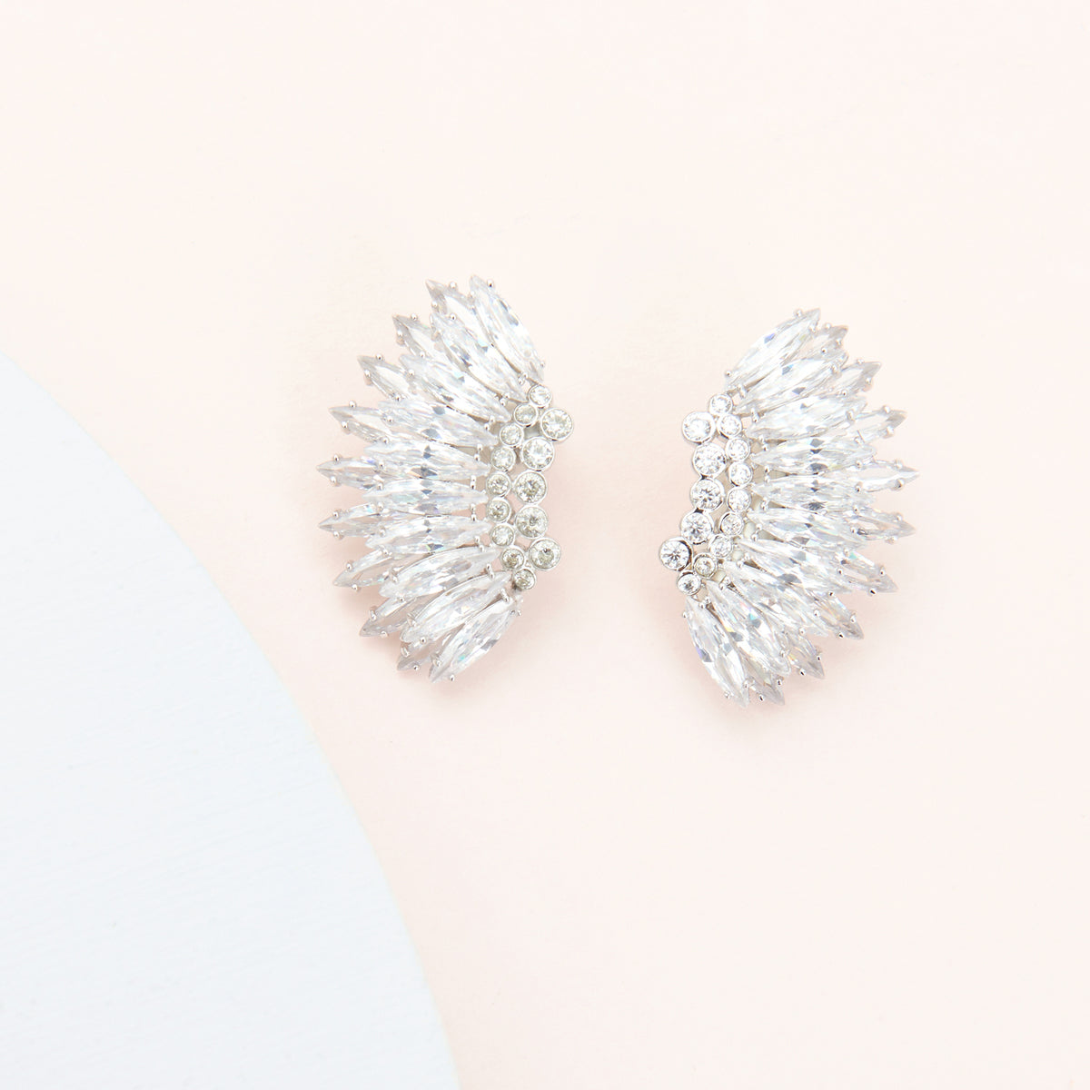 https://mignonnegavigan.com/cdn/shop/products/Mignonne-Gavigan-Crystal-Mini-Madeline-Earrings-Silver-E276-050-1_1200x.jpg?v=1668168760