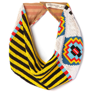 Red, Yellow, Black, Blue, and White Beaded Patterned Scarf Necklace on White Background